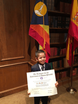 autism-signs-alex-graduation