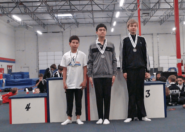 Sean in a gymnastics competition